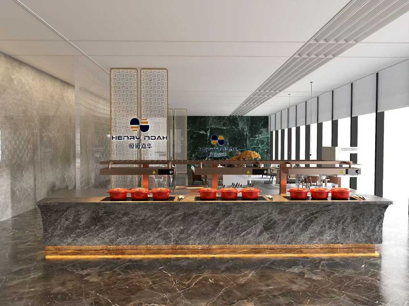 Buffet counter with warming trays and stacked plates