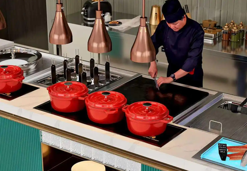 Heat lamp line above a buffet service counter