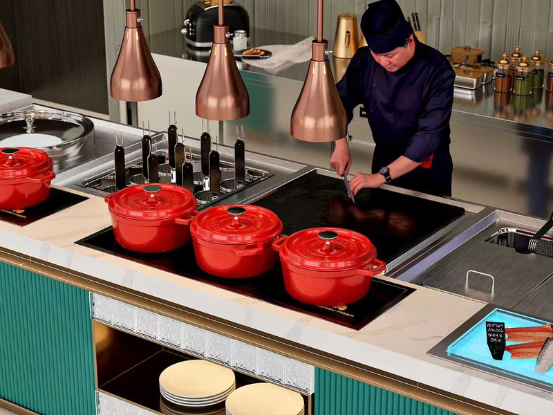 Buffet counter with warming trays and plate stack